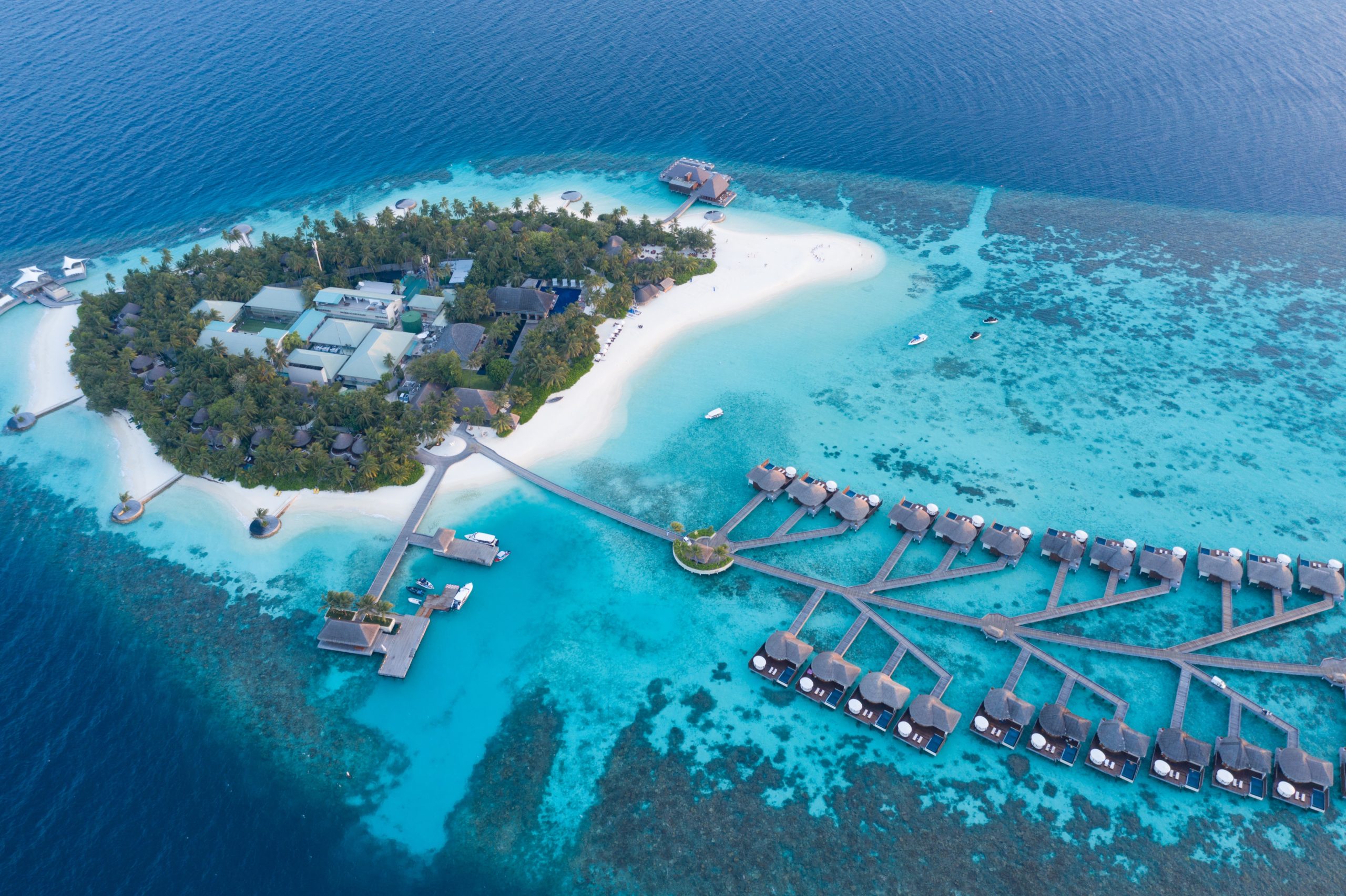 Aerial photo of overwater huts in the Maldives